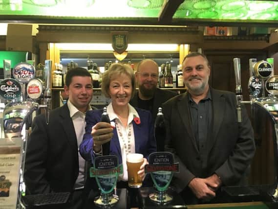 Andrea Leadsom pulls a pint of Ignition with Silverstone Real Ale Brewery