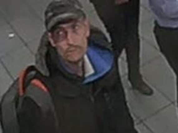 Police want to speak to this man regarding a stolen bank card.